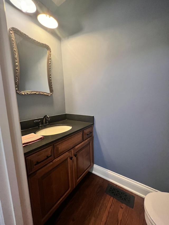 8585 Troy Pike, Versailles, KY 40383 - bathroom with wood finished floors and vanity