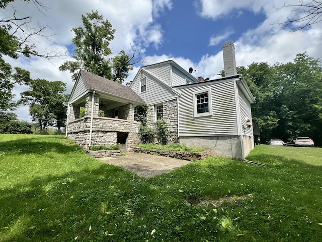8585 Troy Pike, Versailles, KY 40383 - rear view of property with a chimney and a lawn