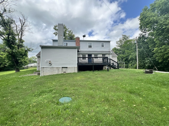 8585 Troy Pike, Versailles, KY 40383 - back of property featuring a deck, a yard, and a chimney