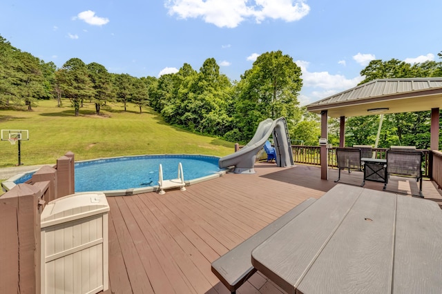 72 Blevins Ln, Vanceburg, KY 41179 - outdoor pool with a deck, a lawn, a gazebo, a water slide, and view of scattered trees