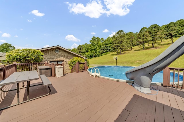 72 Blevins Ln, Vanceburg, KY 41179 - swimming pool featuring a yard, a wooden deck, and outdoor dining space