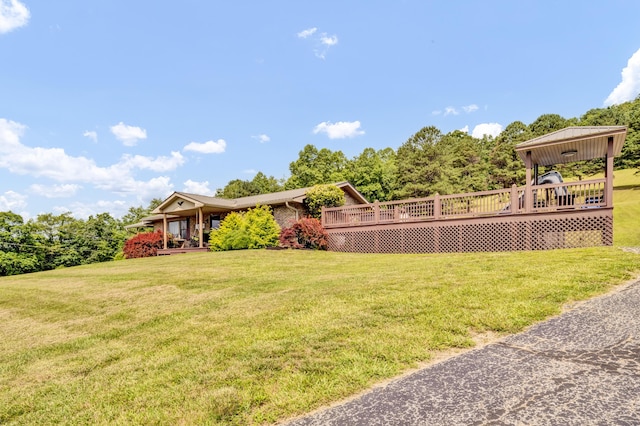 72 Blevins Ln, Vanceburg, KY 41179 - view of green lawn featuring a wooden deck