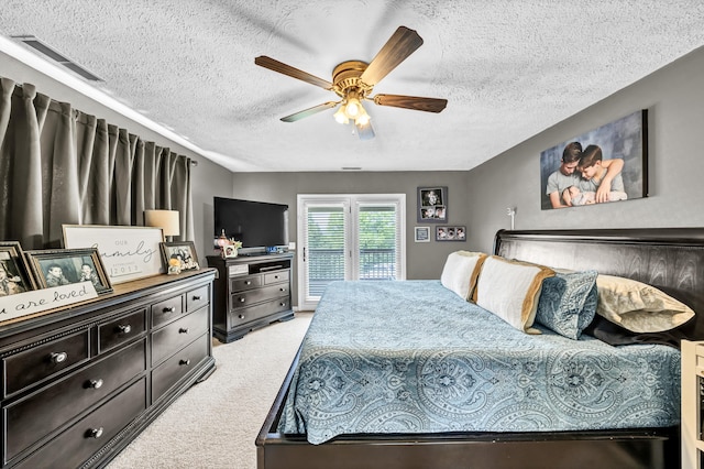 72 Blevins Ln, Vanceburg, KY 41179 - bedroom featuring light colored carpet, a textured ceiling, access to outside, and a ceiling fan