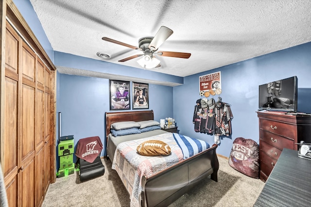 72 Blevins Ln, Vanceburg, KY 41179 - bedroom featuring carpet floors, a closet, a ceiling fan, and a textured ceiling