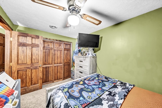72 Blevins Ln, Vanceburg, KY 41179 - bedroom featuring a textured ceiling, ceiling fan, and carpet