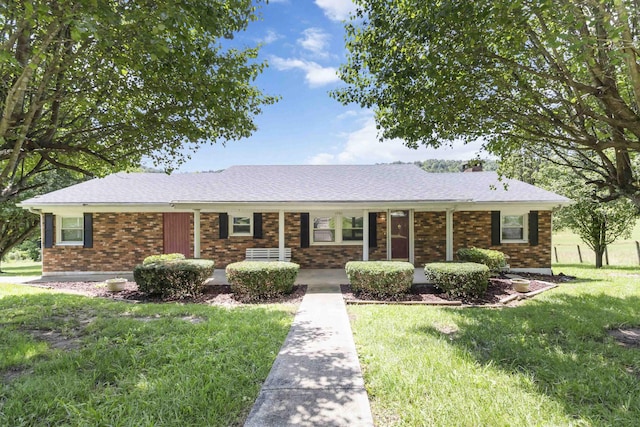 1751 Piney Grove Rd, Somerset, KY 42501 - ranch-style house featuring covered porch, a front lawn, brick siding, and a chimney