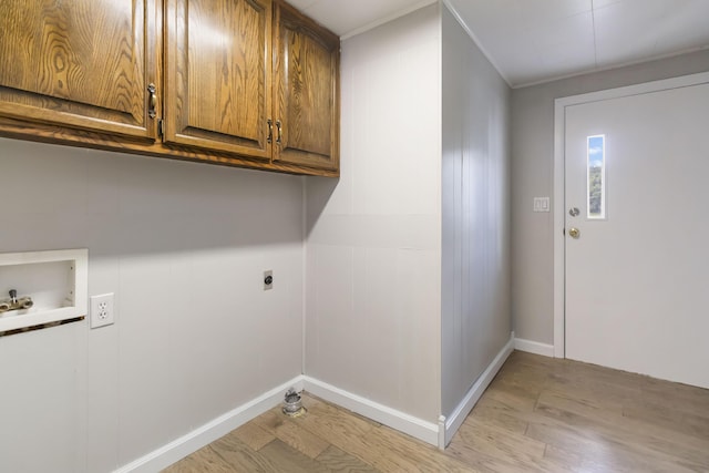 1751 Piney Grove Rd, Somerset, KY 42501 - washroom featuring electric dryer hookup, cabinet space, light wood-type flooring, and washer hookup