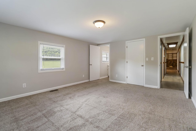 1751 Piney Grove Rd, Somerset, KY 42501 - unfurnished bedroom with multiple windows and carpet