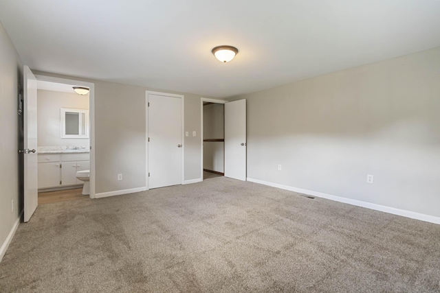 1751 Piney Grove Rd, Somerset, KY 42501 - unfurnished bedroom with light carpet and connected bathroom