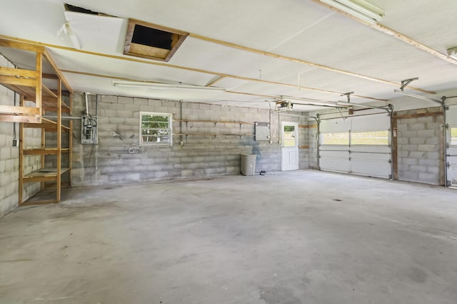 1751 Piney Grove Rd, Somerset, KY 42501 - garage with a garage door opener and concrete block wall