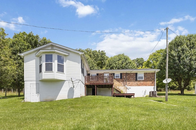 1751 Piney Grove Rd, Somerset, KY 42501 - rear view of property featuring stairway, a deck, a lawn, and brick siding