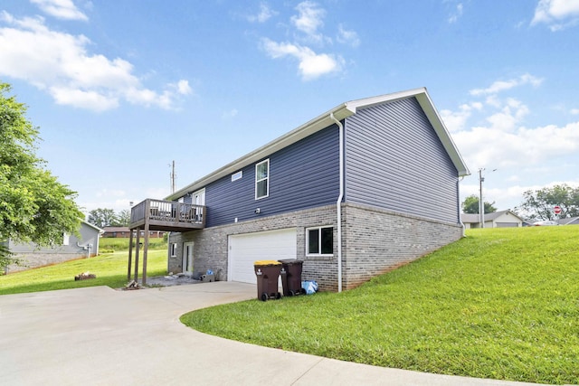 81 Grand Crossing Ct, Somerset, KY 42503 - view of property exterior with an attached garage, brick siding, a lawn, concrete driveway, and a deck