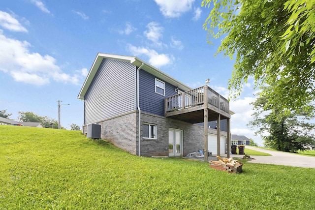 81 Grand Crossing Ct, Somerset, KY 42503 - view of home's exterior with brick siding, a garage, driveway, and a lawn