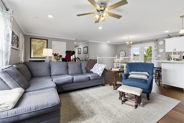 81 Grand Crossing Ct, Somerset, KY 42503 - living area featuring crown molding, a ceiling fan, recessed lighting, dark wood-type flooring, and a chandelier