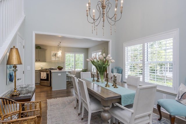 1107 Zoeller Ct, Lexington, KY 40511 - dining area with a chandelier, dark wood-type flooring, and a high ceiling