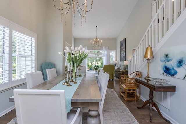 1107 Zoeller Ct, Lexington, KY 40511 - dining area featuring a chandelier, high vaulted ceiling, plenty of natural light, and dark wood-type flooring