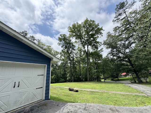 190 Keeneland Trl, Corbin, KY 40701 - view of green lawn with a garage