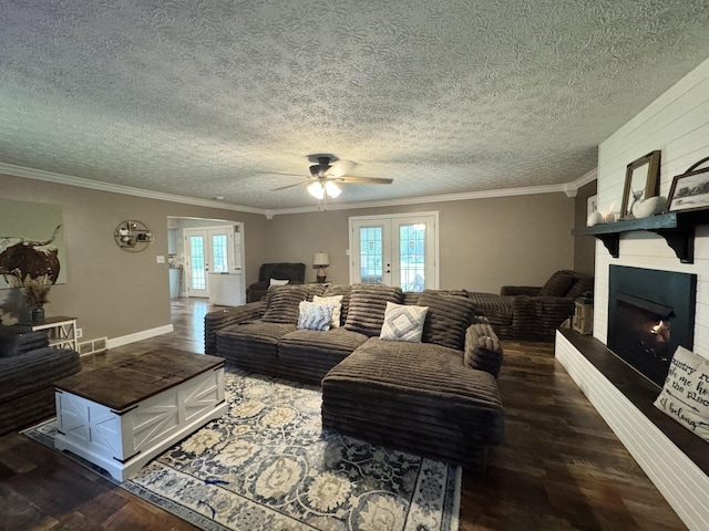 190 Keeneland Trl, Corbin, KY 40701 - living room featuring french doors, healthy amount of natural light, wood finished floors, crown molding, and a textured ceiling