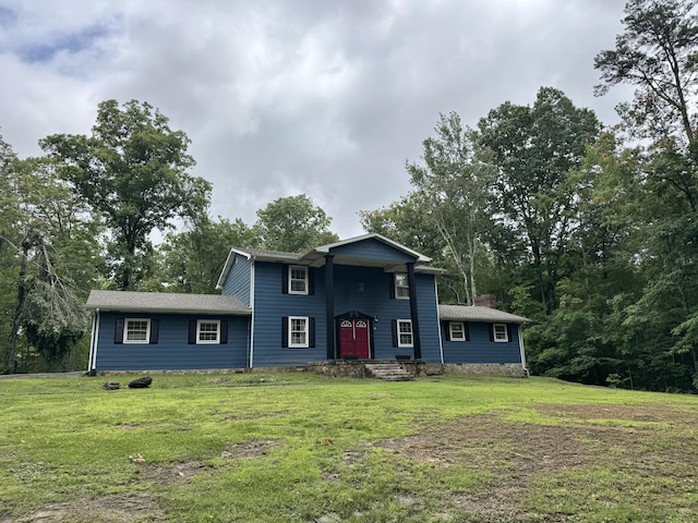 190 Keeneland Trl, Corbin, KY 40701 - traditional-style house with a front lawn and a chimney