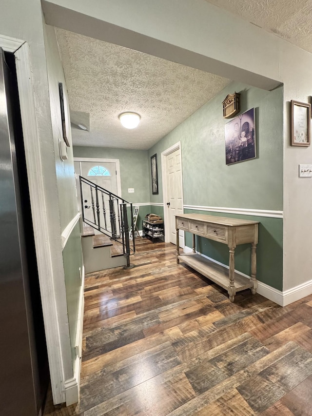 190 Keeneland Trl, Corbin, KY 40701 - hall with a textured ceiling, wood finished floors, and stairway