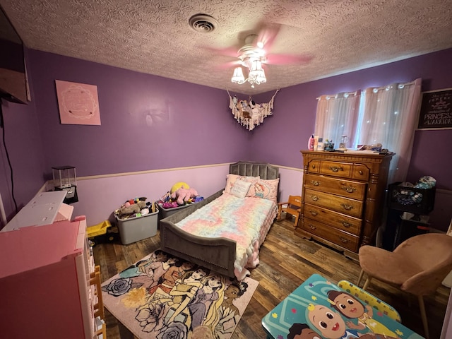 190 Keeneland Trl, Corbin, KY 40701 - bedroom with wood finished floors, a textured ceiling, and ceiling fan