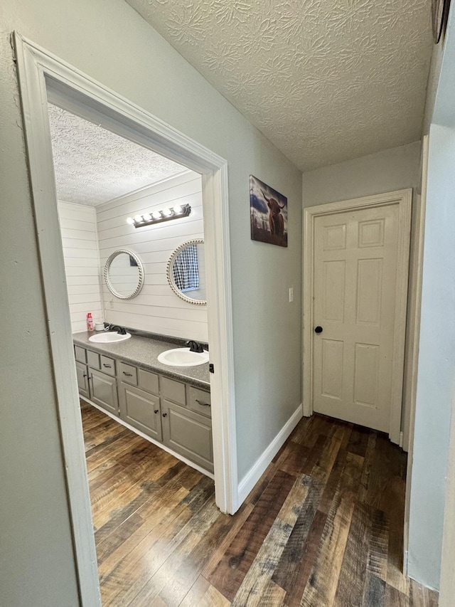 190 Keeneland Trl, Corbin, KY 40701 - corridor featuring a textured ceiling and dark wood finished floors
