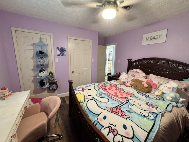 190 Keeneland Trl, Corbin, KY 40701 - bedroom featuring dark wood-style floors, a textured ceiling, and ceiling fan
