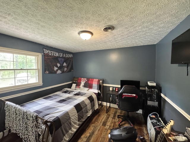 190 Keeneland Trl, Corbin, KY 40701 - bedroom with hardwood / wood-style flooring, a textured ceiling, and an office area