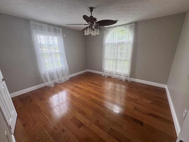 1459 Kit Cowan Rd, Somerset, KY 42501 - empty room featuring hardwood / wood-style floors, a textured ceiling, and ceiling fan