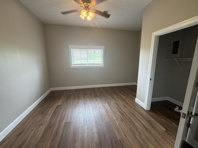 1459 Kit Cowan Rd, Somerset, KY 42501 - unfurnished bedroom featuring dark wood-style floors, a closet, and ceiling fan