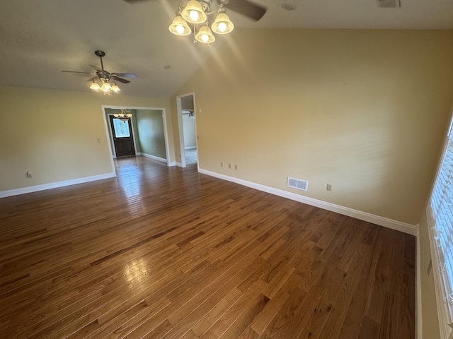 1459 Kit Cowan Rd, Somerset, KY 42501 - spare room with a ceiling fan, a chandelier, dark wood finished floors, and lofted ceiling