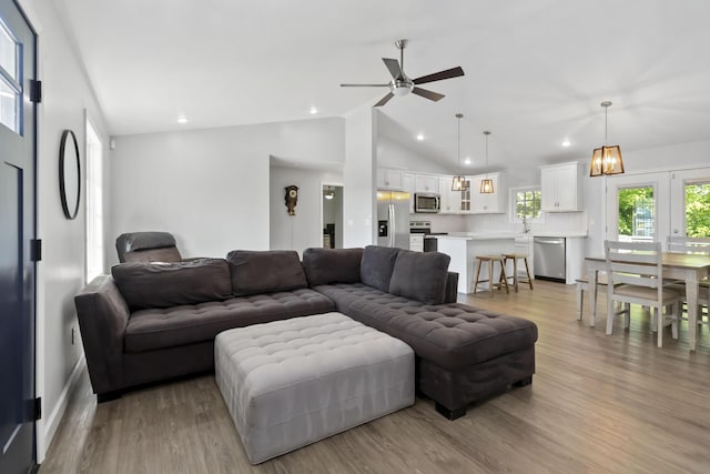 168 Kentucky Ln, Pine Knot, KY 42635 - living room featuring light wood finished floors, a ceiling fan, lofted ceiling, and recessed lighting