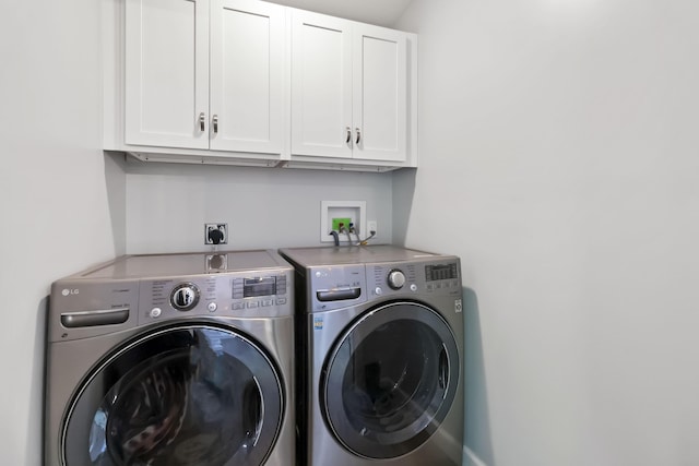 168 Kentucky Ln, Pine Knot, KY 42635 - laundry area with cabinet space and washing machine and dryer