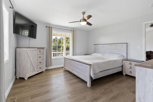 168 Kentucky Ln, Pine Knot, KY 42635 - bedroom featuring wood finished floors and a ceiling fan