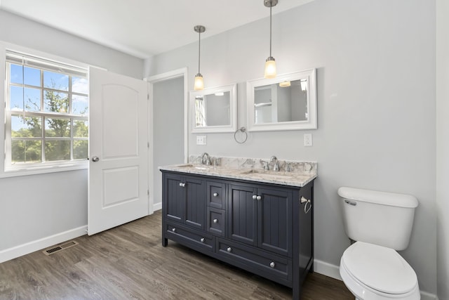 168 Kentucky Ln, Pine Knot, KY 42635 - bathroom with double vanity and wood finished floors