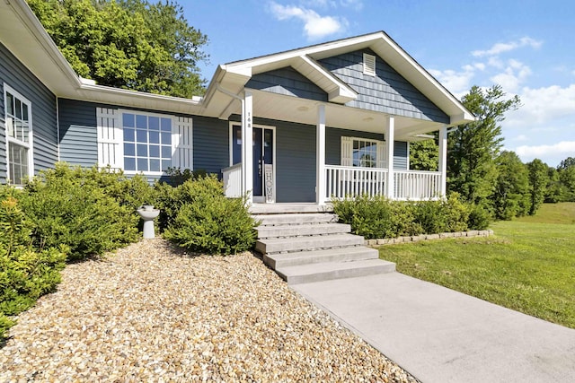 168 Kentucky Ln, Pine Knot, KY 42635 - view of front of home featuring a porch and a front yard