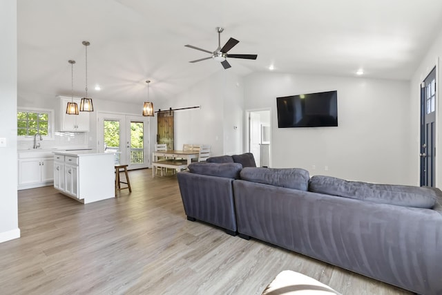 168 Kentucky Ln, Pine Knot, KY 42635 - living room with french doors, ceiling fan, lofted ceiling, light wood finished floors, and recessed lighting