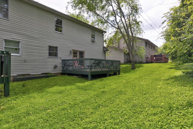 109 Quail Ridge Rd, Winchester, KY 40391 - rear view of house with a deck and a lawn