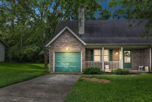 109 Quail Ridge Rd, Winchester, KY 40391 - view of front of house featuring covered porch, brick siding, a garage, and driveway