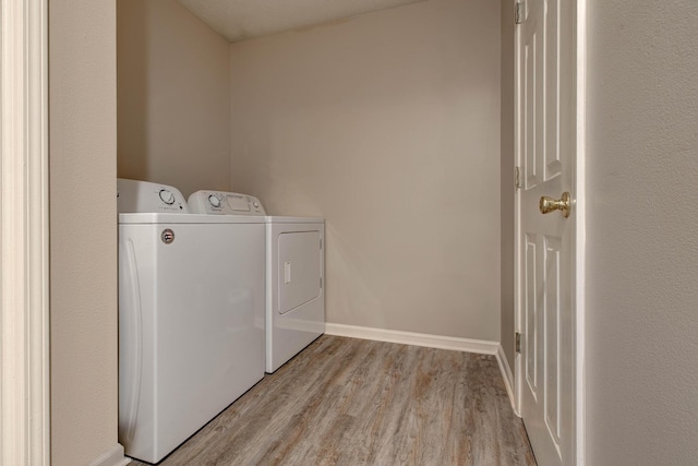 111 Quail Ridge Rd, Winchester, KY 40391 - laundry area featuring washing machine and dryer and light wood-type flooring