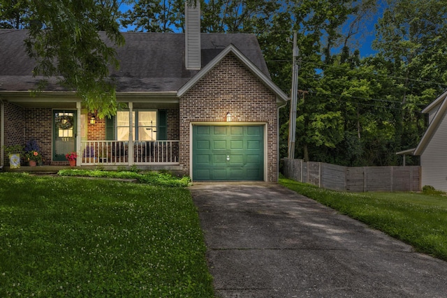 111 Quail Ridge Rd, Winchester, KY 40391 - view of front of house featuring concrete driveway, a garage, brick siding, a porch, and a chimney