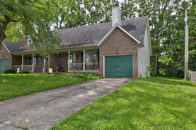 111 Quail Ridge Rd, Winchester, KY 40391 - view of front of home featuring an attached garage, covered porch, and brick siding