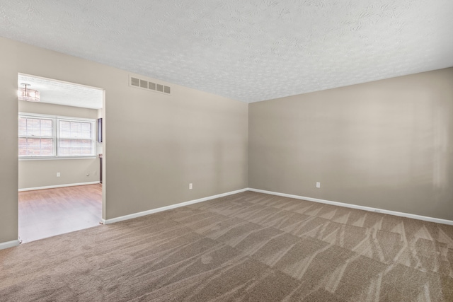 3848 Mcgarry Dr, Lexington, KY 40514 - unfurnished room with carpet flooring and a textured ceiling