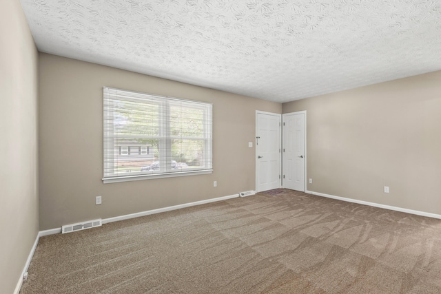 3848 Mcgarry Dr, Lexington, KY 40514 - spare room with a textured ceiling and carpet flooring
