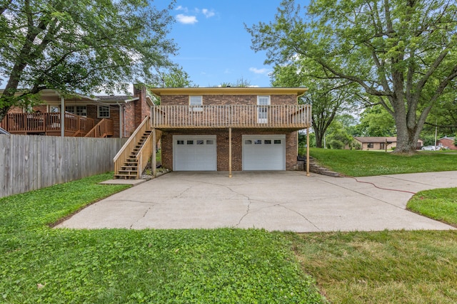 3848 Mcgarry Dr, Lexington, KY 40514 - view of property exterior with brick siding, driveway, a garage, and stairs