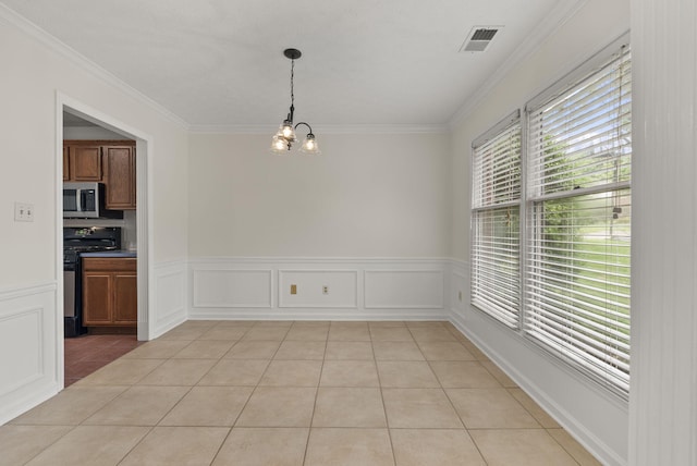 1048 Vero Ct, Lexington, KY 40509 - unfurnished dining area with a chandelier, ornamental molding, a wainscoted wall, and light tile patterned floors