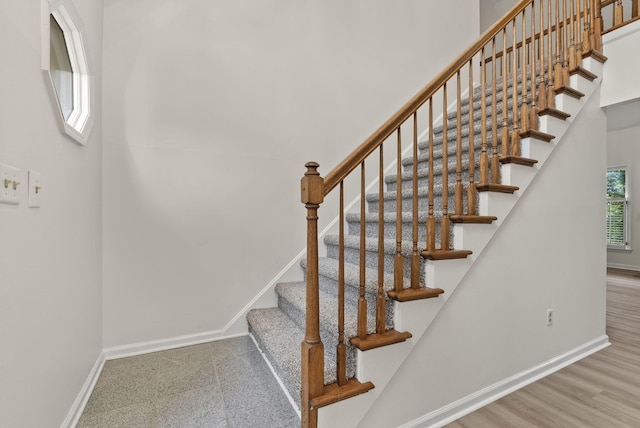 1048 Vero Ct, Lexington, KY 40509 - staircase featuring a towering ceiling