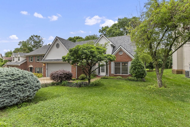 1048 Vero Ct, Lexington, KY 40509 - view of front of house featuring brick siding, an attached garage, a front lawn, and roof with shingles