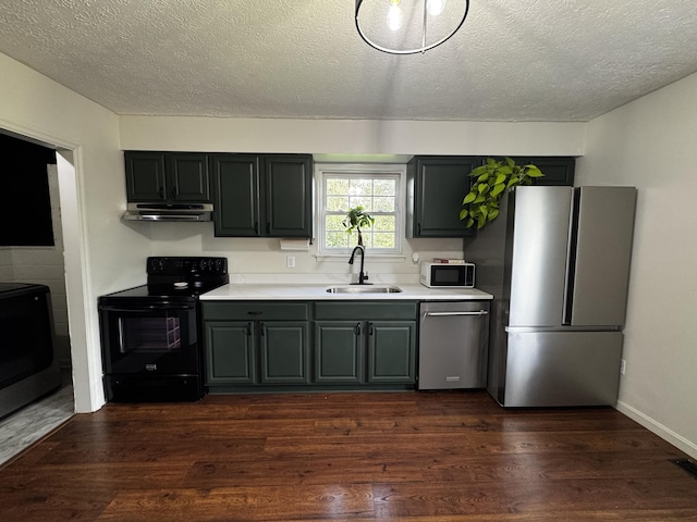 109 Creekstone Ct, Frankfort, KY 40601 - kitchen with black appliances, under cabinet range hood, light countertops, a textured ceiling, and dark wood finished floors