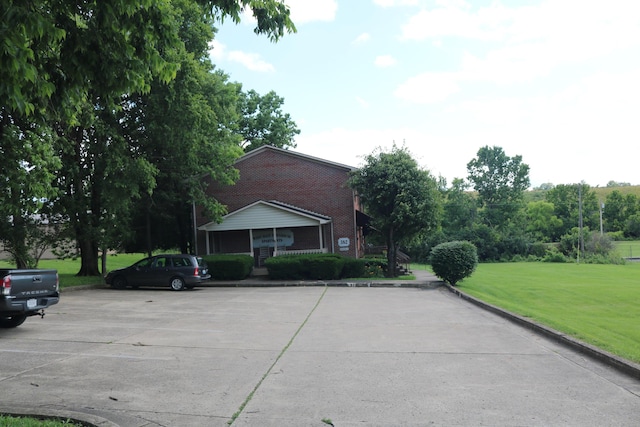 382 W Main St, Carlisle, KY 40311 - view of concrete road featuring curbs